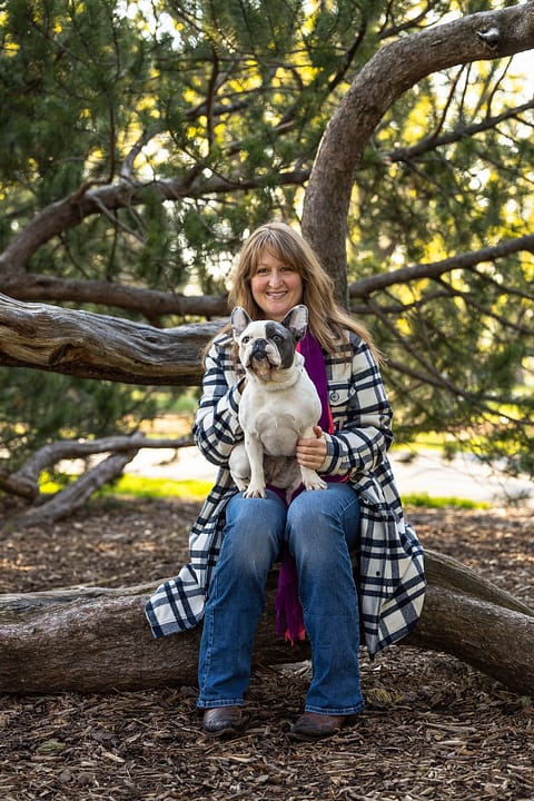 dog mom and her dog sitting Gage Park in Hamilton, ON